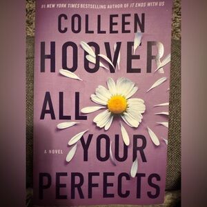 Purple and White Coffee Table Book Accent